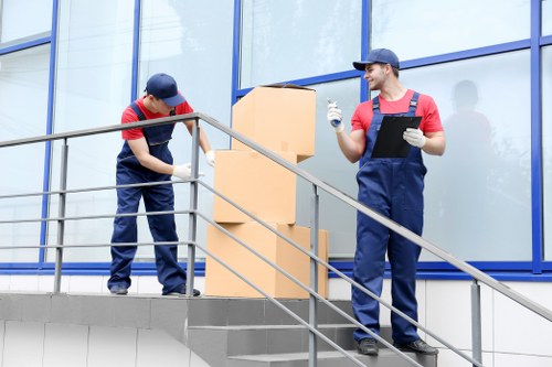 Professional movers loading a van in Kingston