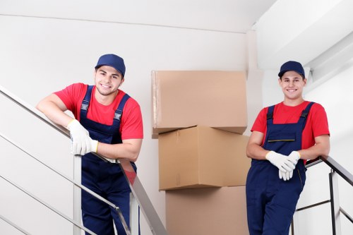 Professional movers packing furniture during same day removals in Kingston