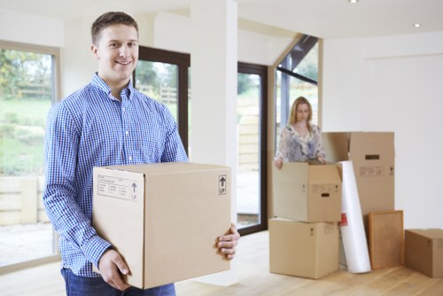 Moving crew reviewing safety steps during a home relocation