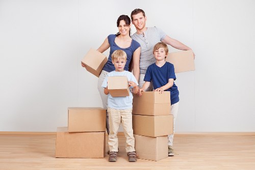Student packing belongings for a move in Kingston