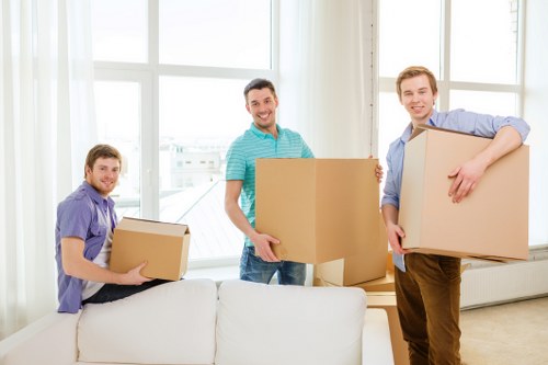 Packed office boxes and equipment ready for relocation in Kingston