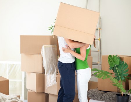 Unpacking boxes and organising a new home in Kingston