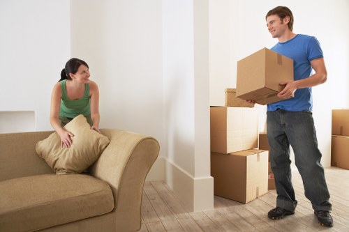 Loading boxes into a moving truck in Kingston